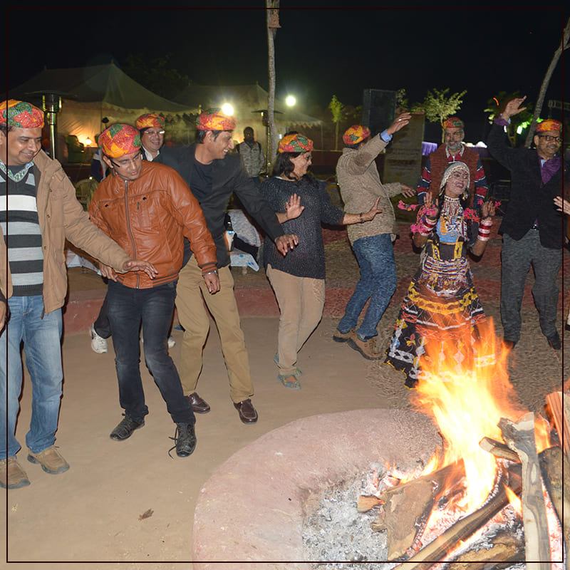 Rajasthani Folk Dance With Bonfire At The Camp Site.